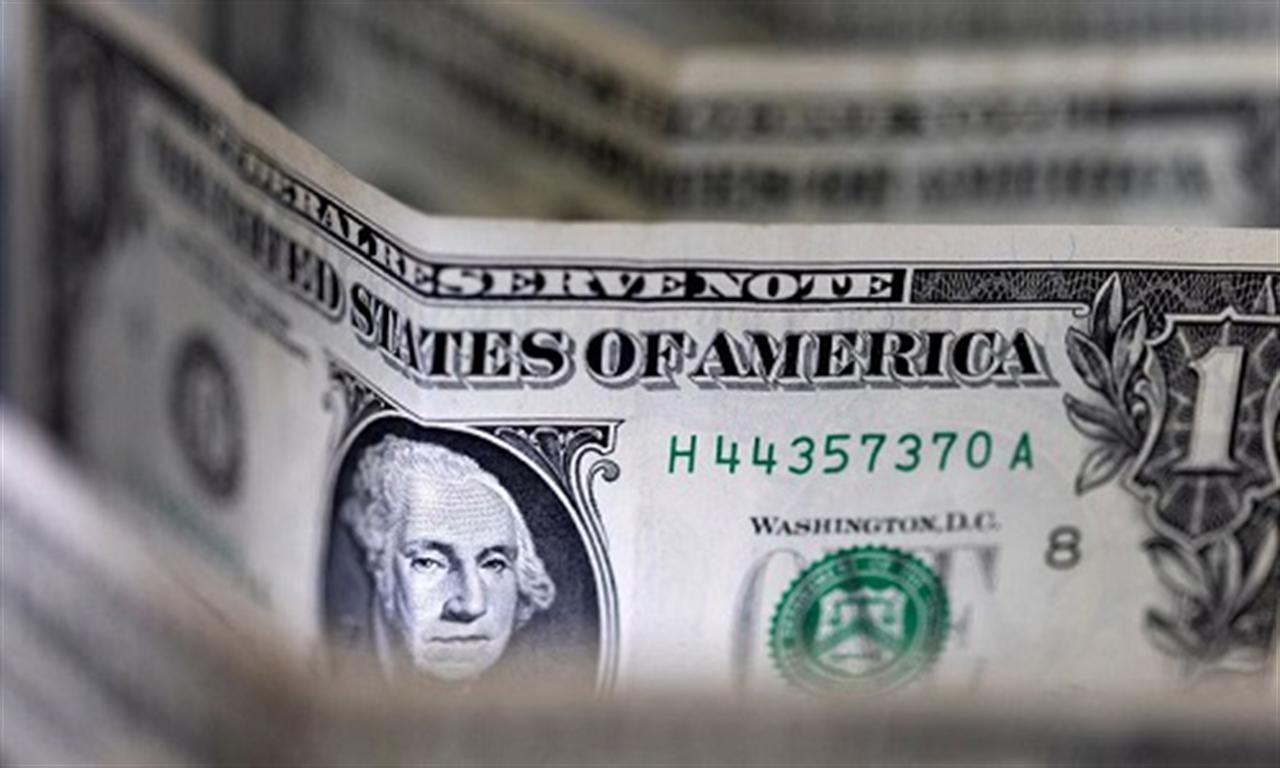 Dollar edges lower; tight trading ranges ahead of CPI